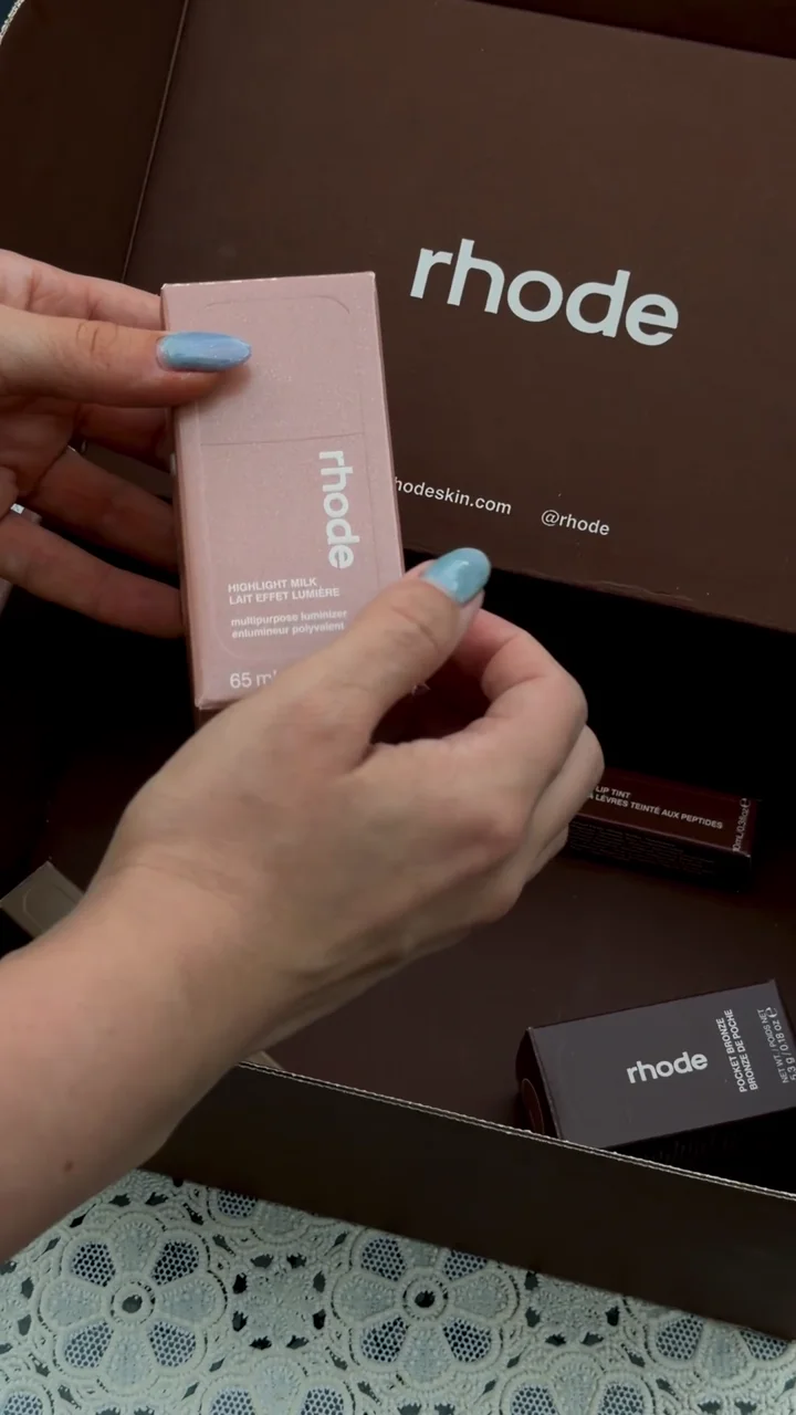 Sofiya opening a Rhode beauty package and revealing the products inside