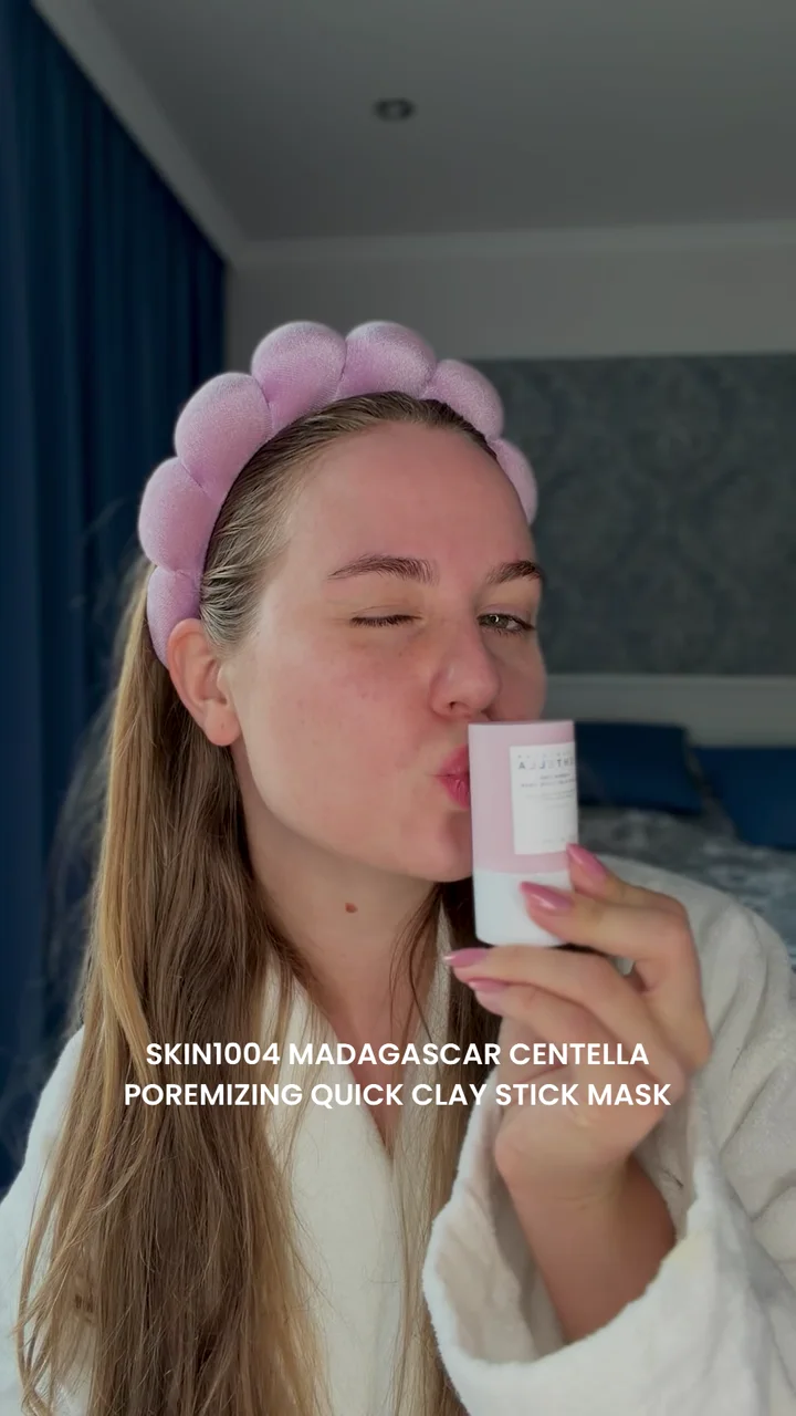 Sofiya applying SKIN1004 Madagascar Centella Poremizing Quick Clay Stick Mask